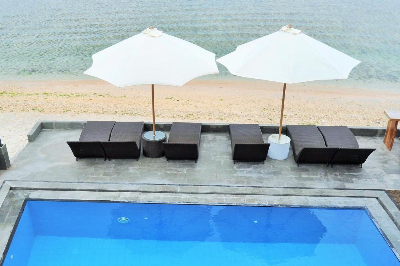 Pradana Beach Inn Luxury Batununggul Luaran gambar